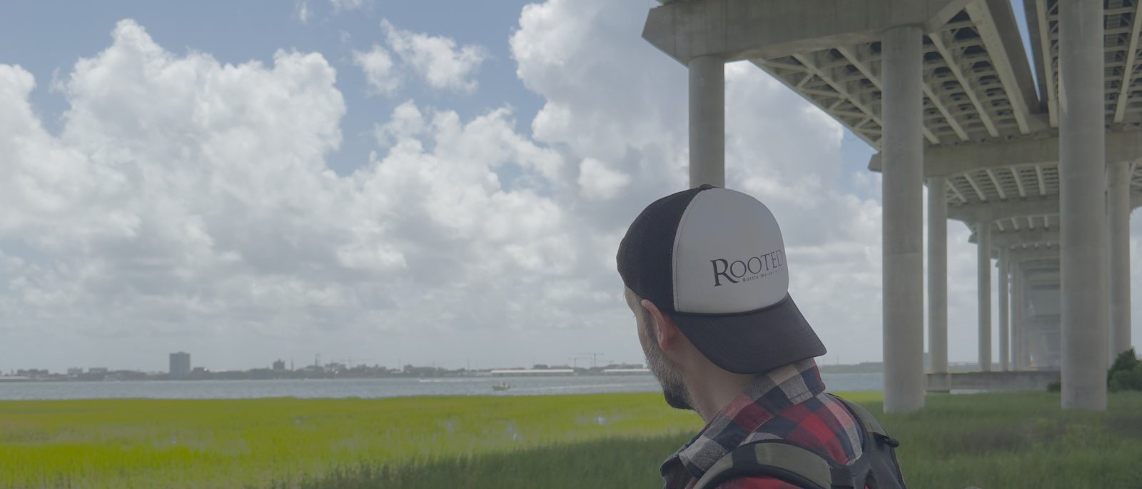 Joe looking out over the marsh and river beneath the Ravenel Bridge, Charleston